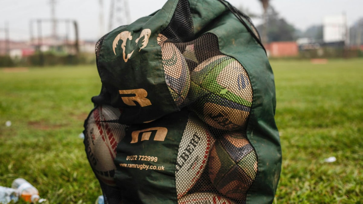 Sports balls and gear packed for field use.