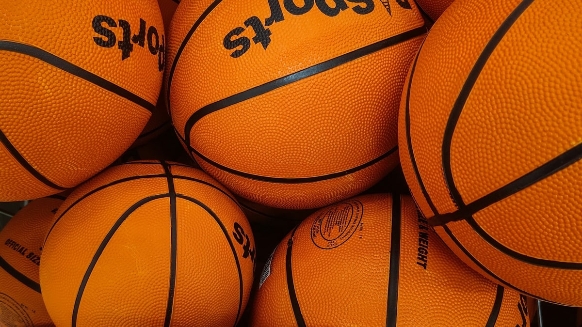 Different sports balls grouped together for equipment planning.
