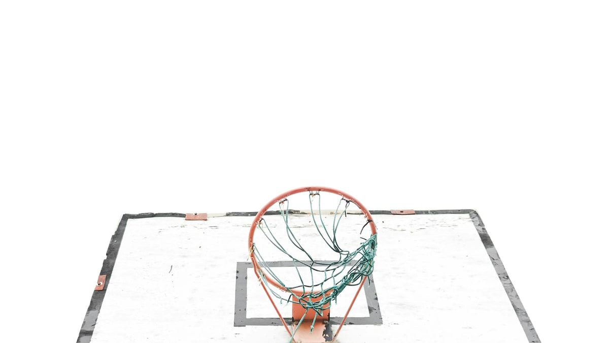 Basketball and soccer equipment arranged for a pump comparison.